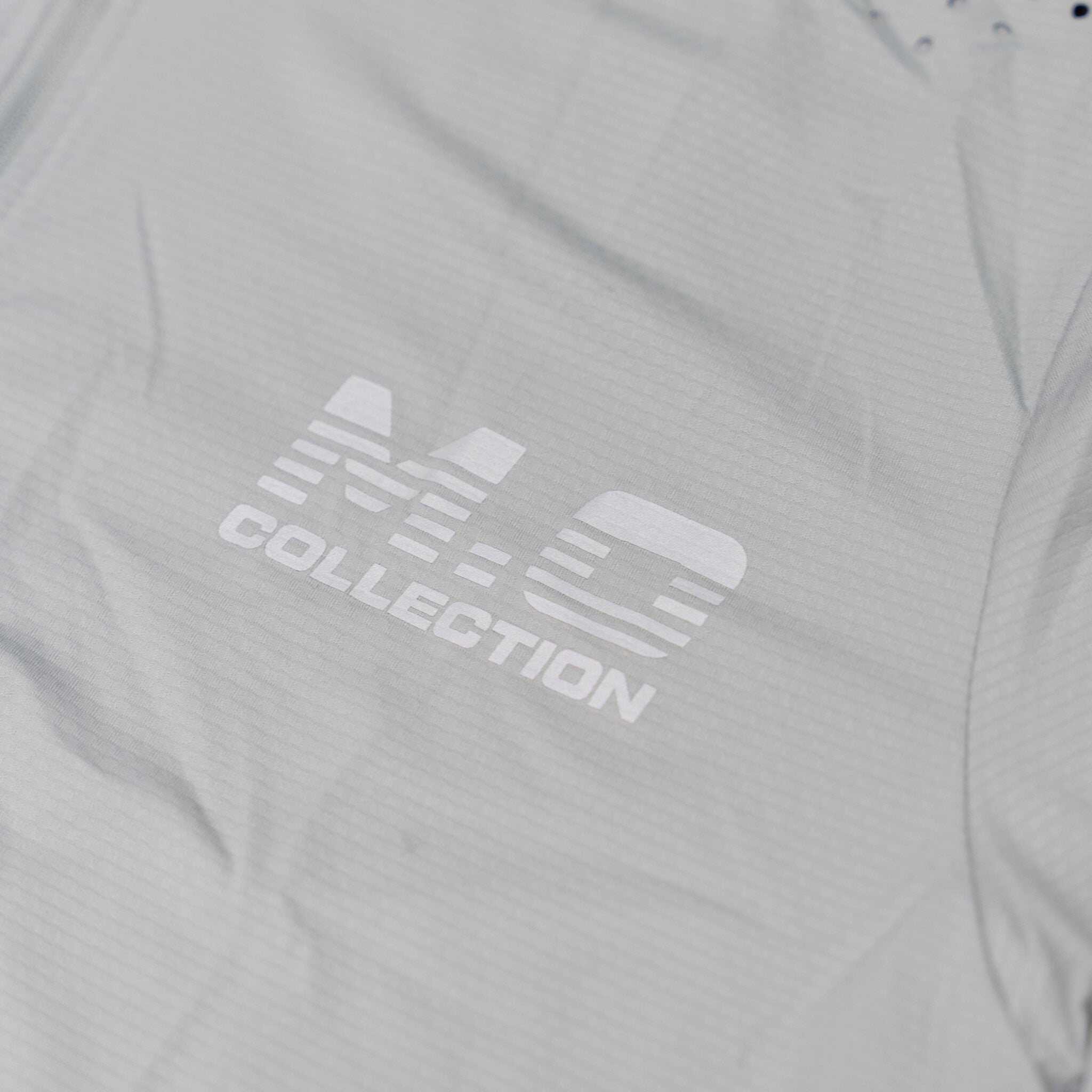 reflective motion core 1/4 zip long sleeve (fitted)